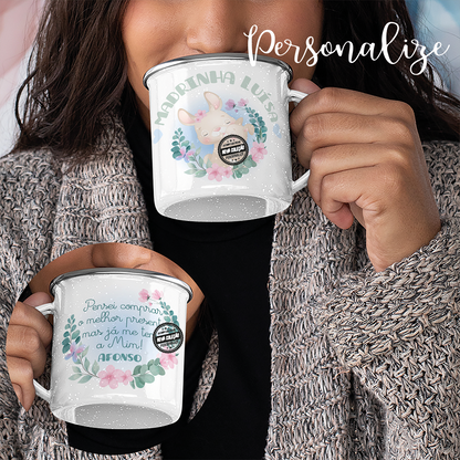 Caneca "Madrinha, pensei comprar o melhor presente mas já me tens a mim!. Surpreenda quem mais importa com presente super especiais personalizados por si. Disponível com versão de desenho  azul quando oferece um menino ou rosa quando oferece uma menina.