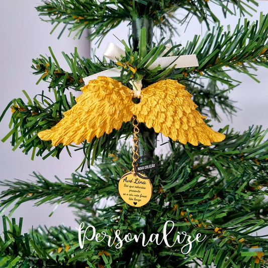 Pendente para árvore de natal em forma de asa de anjo com purpurinas, fitinha de cetim e medalha em aço inóx. Pode personalizar a medalha com pequena frase que desejar. 